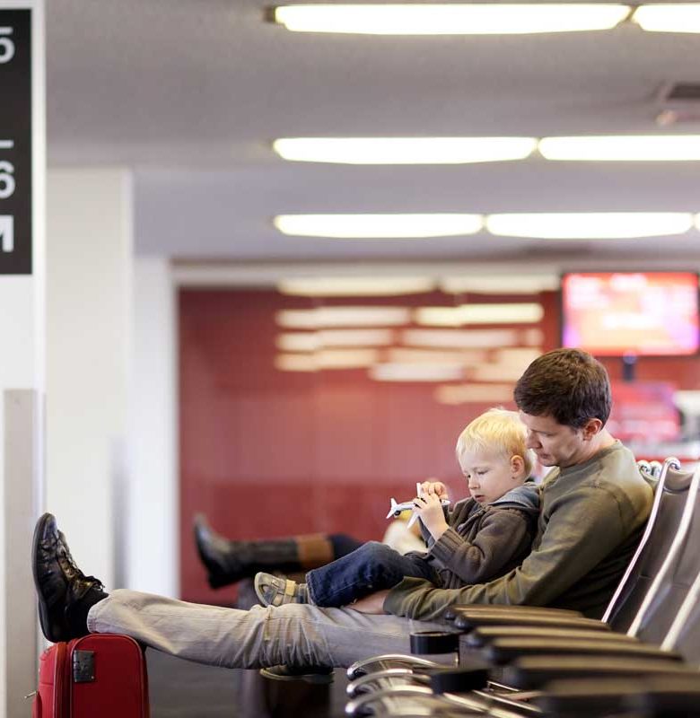airport waiting man and child