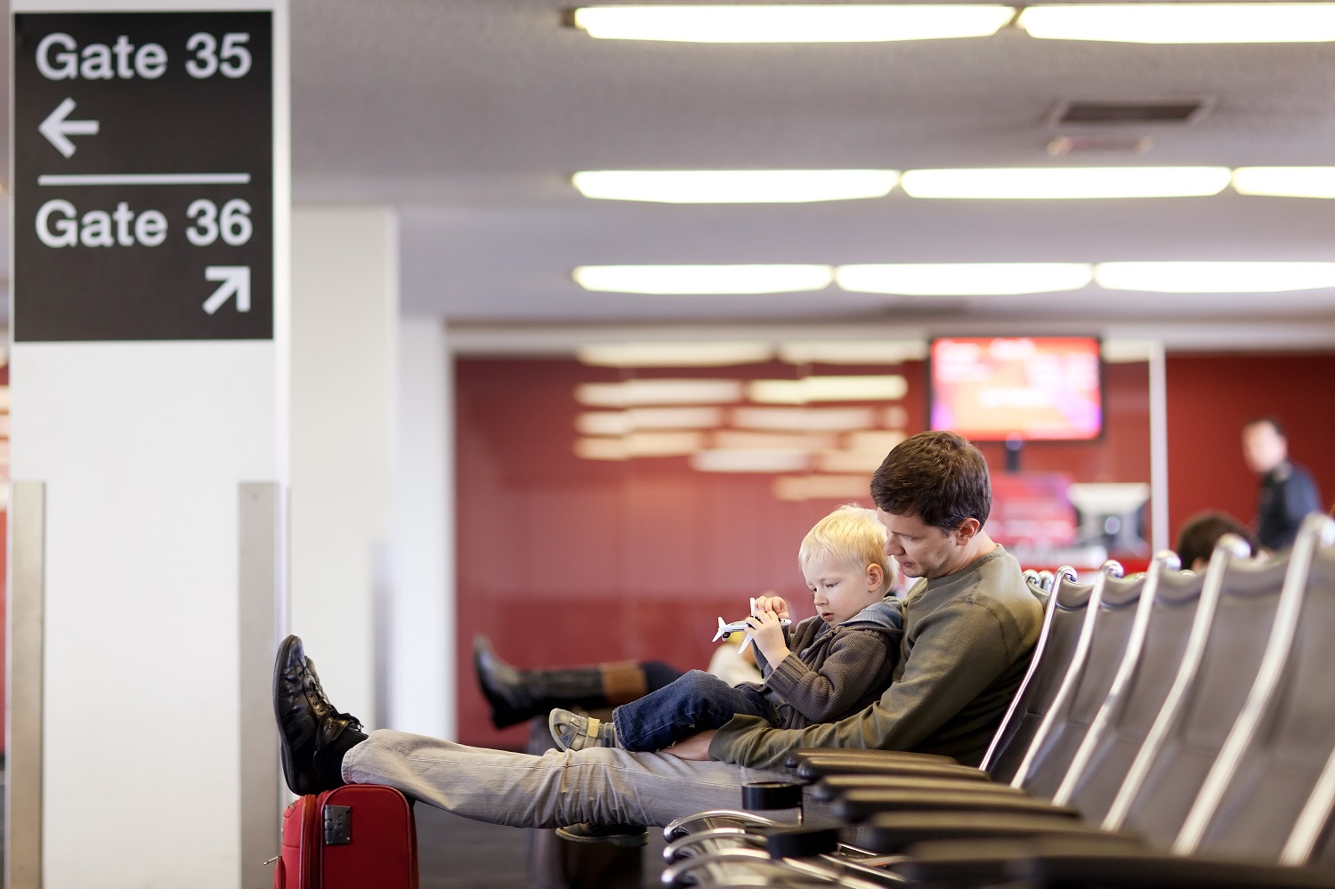 airport waiting man and child