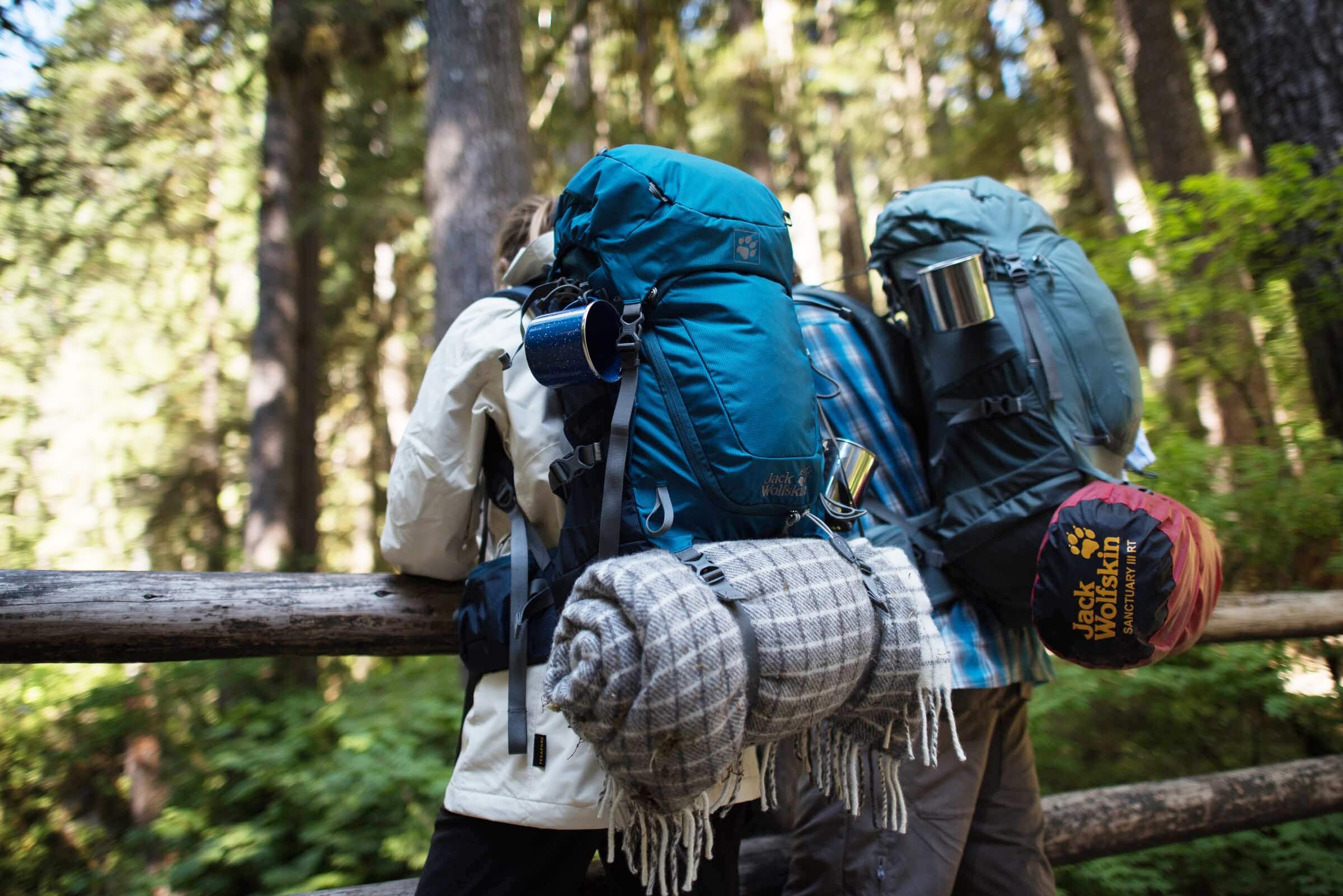 backpacking couple woods bag