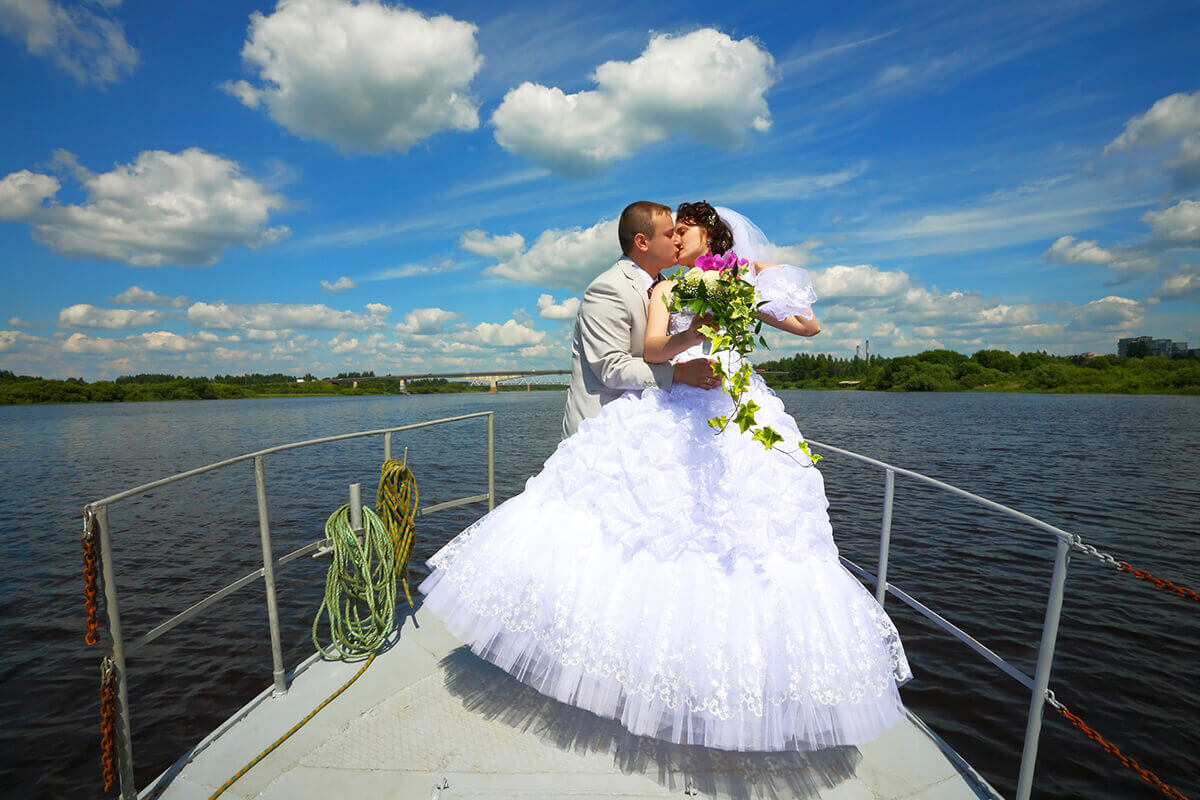 bride and groom on boat